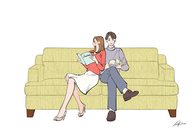 カップル,ソファに座る,本を読む,読書,リビング